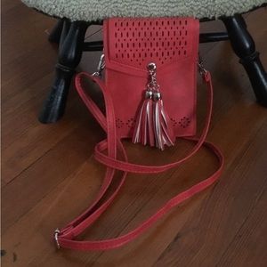Red crossbody purse with tazzles